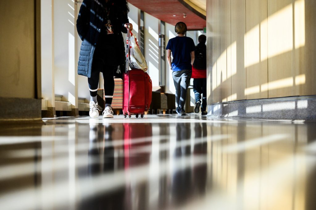 Residents in the midst of moving into the residence hall 