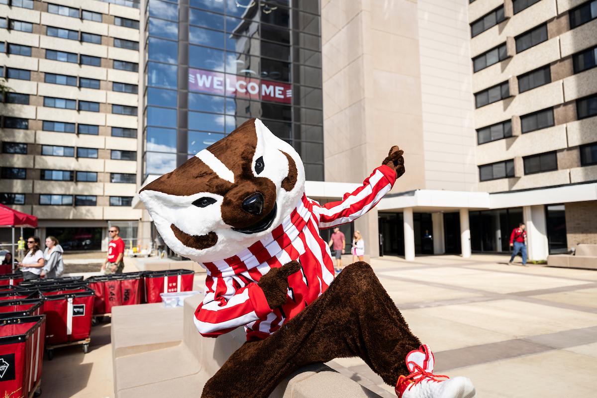 Bucky Badger welcomes family members helping their new student moving into Residence Halls